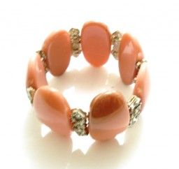 Pulseira dourada com laranja e strass